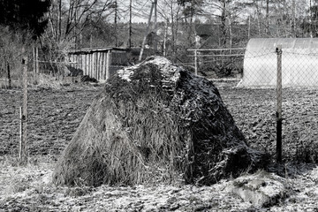 haystack on the street in the village