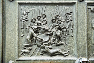 Relief der Kappeler Milchsuppe, am Tor des Grossmünsters, Zürich, Schweiz