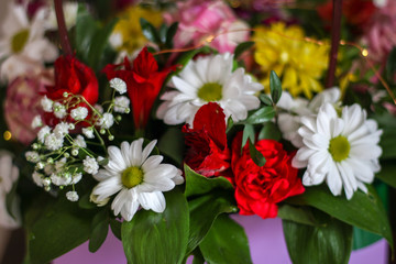 bouquet with different colored flowers in a box