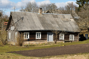 Fototapeta na wymiar Old wooden log house, Countryside in Lithuania