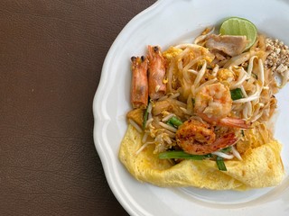 Stir fried noodle pad thai chicken very popular in sydney good with lemons