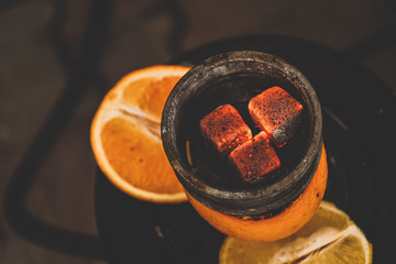Coals for hookah in smoke
