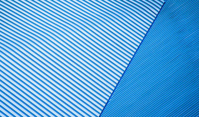 Obraz premium underside panoramic and perspective view to steel blue glass high rise building skyscrapers, business concept of successful industrial architecture