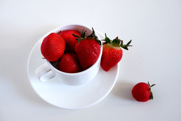 Strawberries in a Cup. On white background