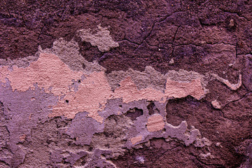 Purple colored abstract wall background with textures of different shades of purple or violet