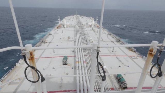 Very large crude oil tanker ship in ocean top view