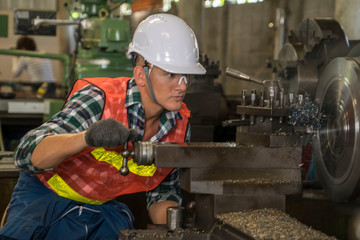 Factory Engineer Operating Hydraulic Bender and Technician Working metalwork control in industrial.Heavy Industry concept.