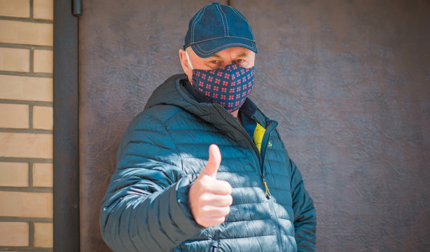 Stop Virus ! Senior Man In Textile Homemade Cotton Mask  