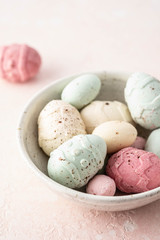 Chocolate candy multi-colored small easter egg. Top view.