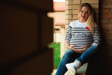 Young preganant woman expecting a baby relaxing