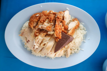 rice topped with chicken or chicken rice