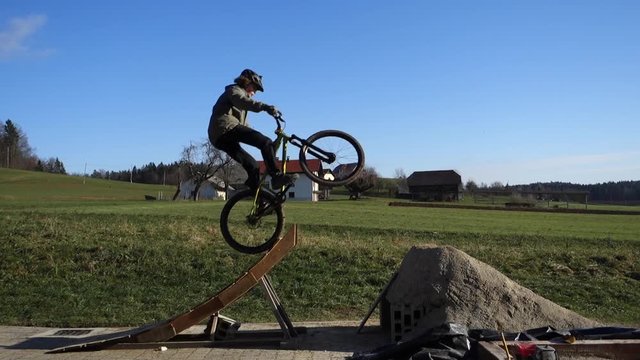 Man jumps his dirt jump bike