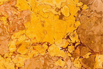 warm colored natural marble panel, natural beautiful marble in dark and warm colors, marble background texture, closeup