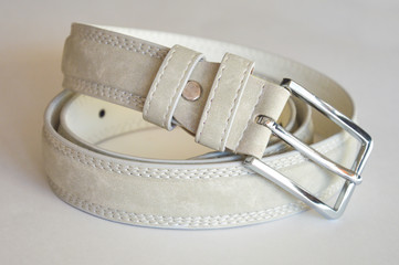 Leather belt. white belt on a light background.