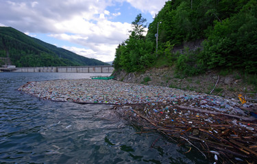Water pollution in a mountain lake