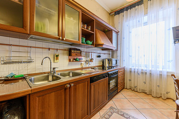 Russia, Moscow- November 20, 2019: interior room apartment modern bright cozy atmosphere. general cleaning, home decoration, preparation of house for sale. kitchen, dining area