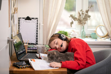 Coronavirus. Quarantine. Online training education . Computer, laptop and girl studying remotely. Coronavirus pandemic in the world. Closing schools