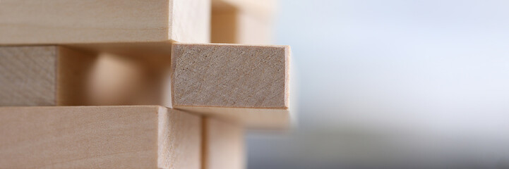 Close-up wooden blocks stacked in construction