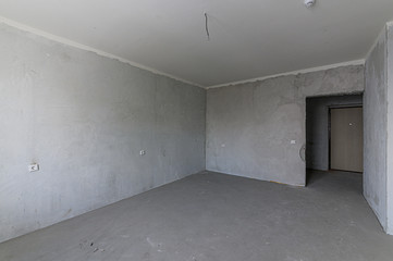 Russia, Moscow- November 20, 2019: interior room apartment rough repair for self-finishing. interior decoration, bare walls of the room, stage of construction