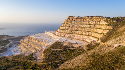 Aerial view of a gypsum quarry mine on the coast of Crete, Greece © sunfreez