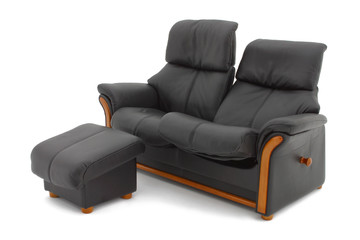Leather sofa with leg rest.