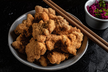Delicious crispy fried chicken breast strips.