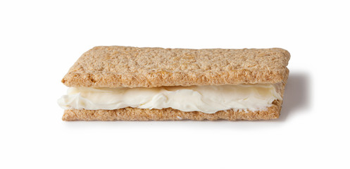crispreads slices with cream cheese, isolated on white background