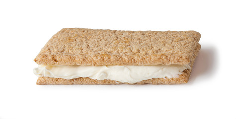 crispreads slices with cream cheese, isolated on white background