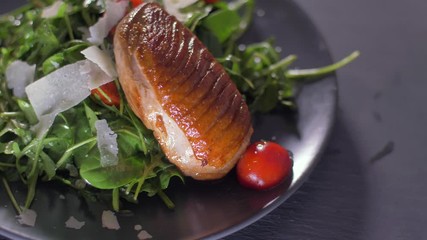 sprinkle of arugula salad and entrecote with parmesan.