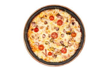 Black pizza with seafood on a wooden round plate on a white background. Cheese, shrimp, octopus, squid rings, tomatoes.