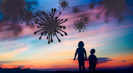 Fototapeta premium Silhouette Little Chinese girl raised hands for protection virus Covid-19.Kid girl praying in for fight and get out from coronavirus pneumonia covid19 virus.Little asian girl hand praying to GOD help.