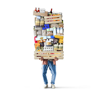 Man holds a box with a huge pile of food