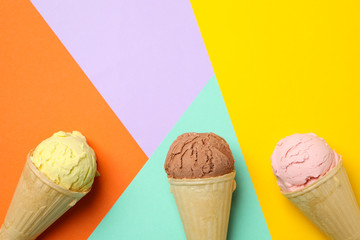 Ice cream on multicolor background, space for text