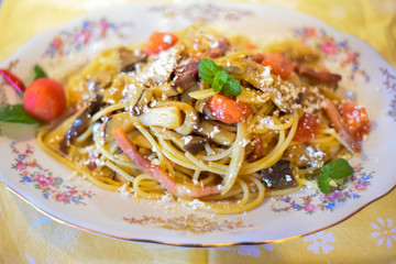 Spaghetti in the Plate With Condiments