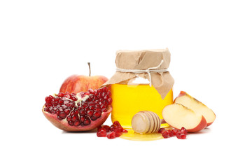 Apple, pomegranate and honey isolated on white background. Natural treatment