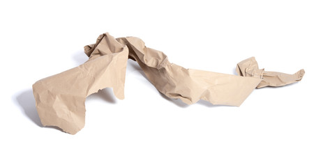 Torn piece of packing paper on white background with shadows