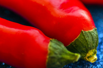 Red pepper close-up. Macro. Two pods of ripe, hot pepper.