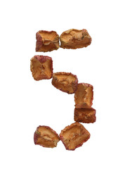 Number five made from dried apples. Isolated on white.