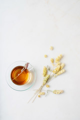 Obraz na płótnie Canvas Cup of herbal tea. Abstract pattern.