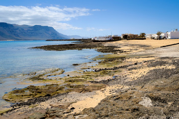 Fototapeta na wymiar volcanic rocks coastline in caleta de sebo, la graciosa, canary islands