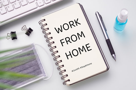 Covid 19 work at home concept. Pandemic Covid-19 Coronavirus quarantine concept. Mockup notebook for Covid19. Social distancing employee work at home to prevent virus infection in Covid-19 Outbreak.