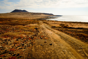 view of a road near the coastline in la graciosa, canary islands