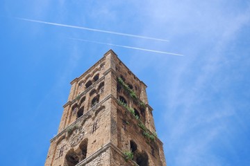 Historical old building facade with jet print view in clearblue sky at village of Moustiers Saint Marie, Provence, France