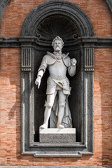 Fototapeta na wymiar Carlo V statue at the entrance of Royal Palace in Naples, the work of Vincenzo Gemito of 1888