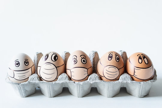 Diverse chicken eggs with doodle faces wearing medical masks with white background