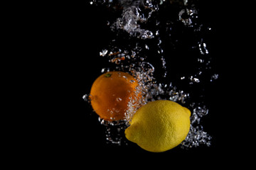 Fototapeta na wymiar Orange Citrus Water Splash