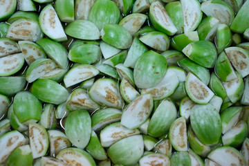 Cut Thai green eggplant soak in water