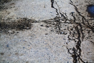 Asphalt texture with cracks. Background for layout booklets