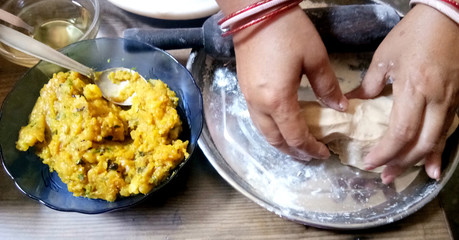 Making of Traditional Indian bread - Aloo paratha or aalu parotha, potato stuffed bread