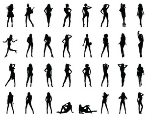Fototapeta na wymiar Black silhouettes of beautiful girls in various poses on a white background